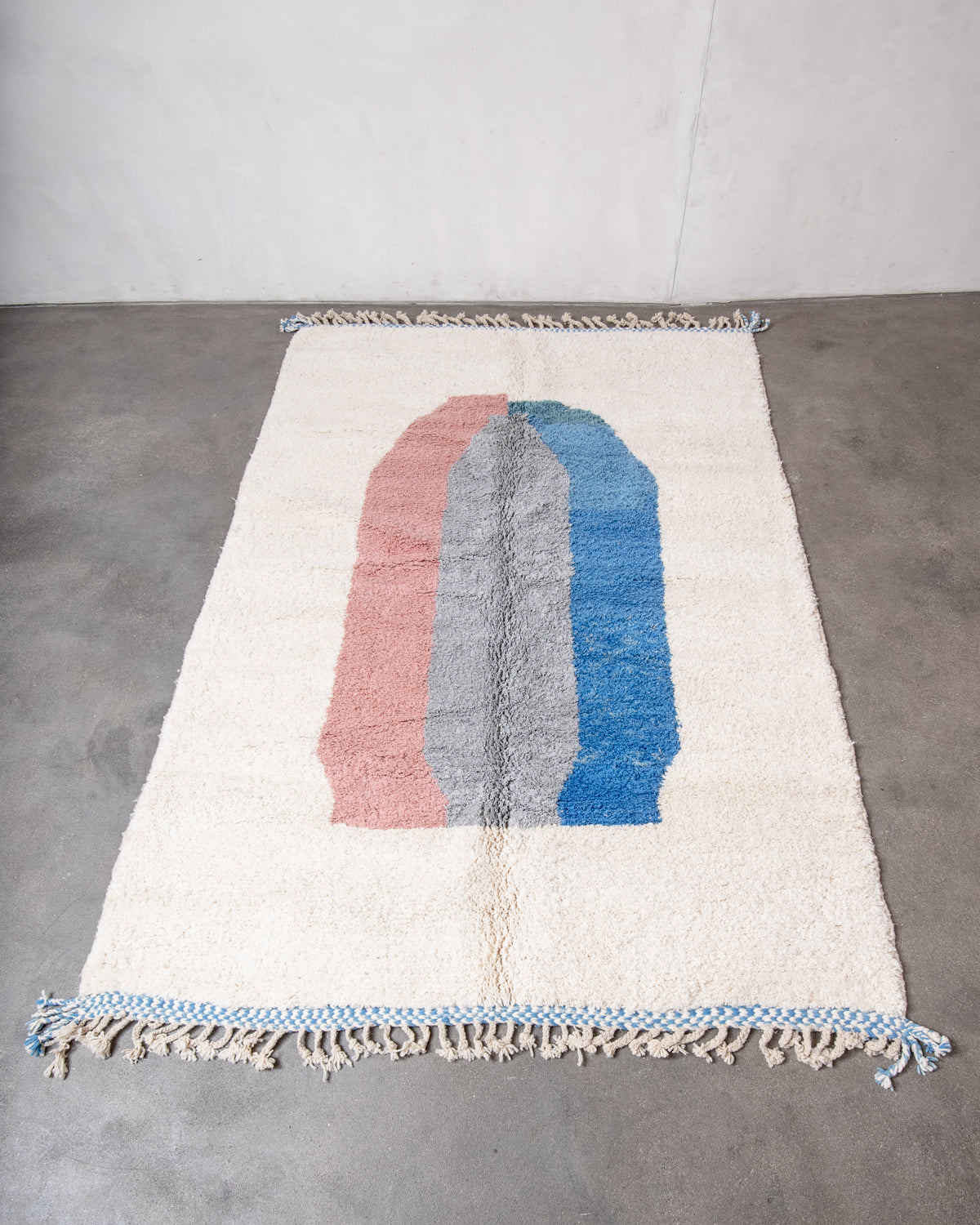Modern, designer, handcrafted Berber rug from Morocco. Beniourain carpet with beautiful colours and patterns and fluffy wool texture.